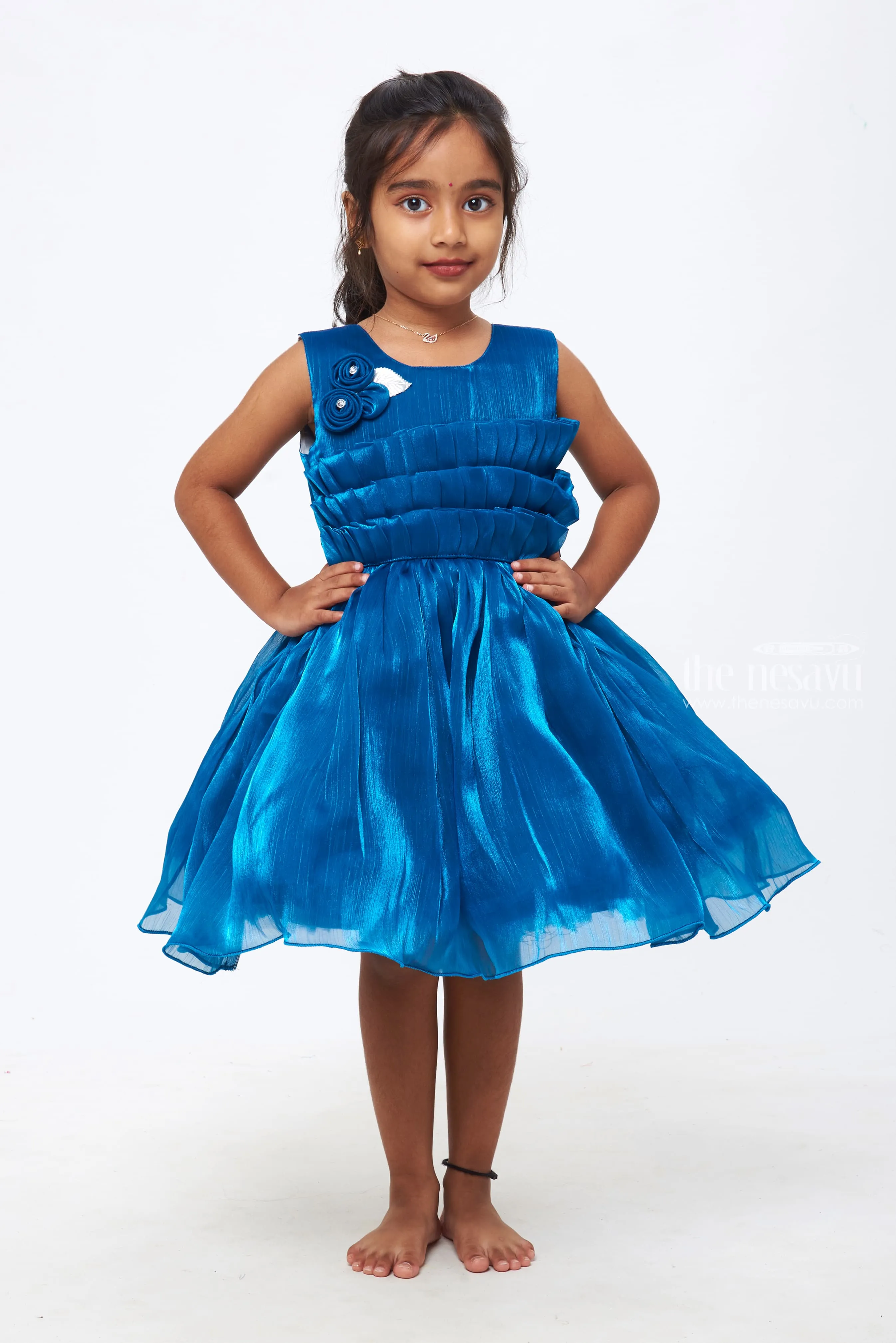 Azure Elegance: Girls Deep Blue Tulle Dress with Rosette Embellishments