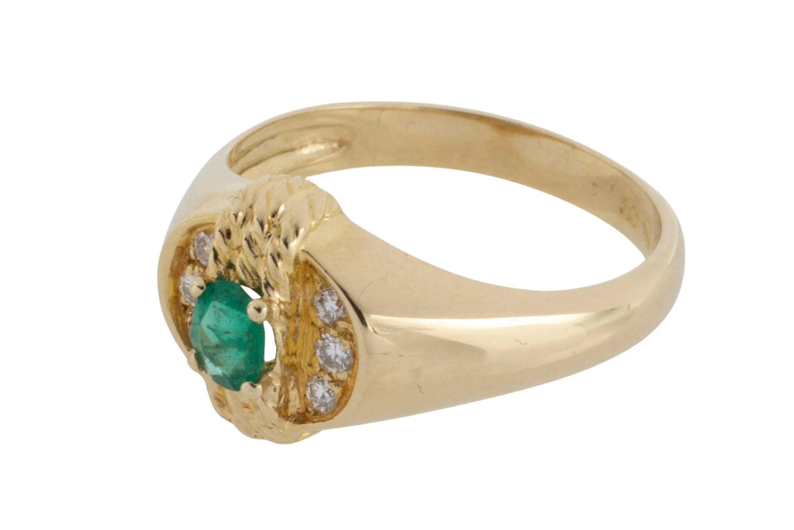 Emerald and diamond ring in 18 carat gold