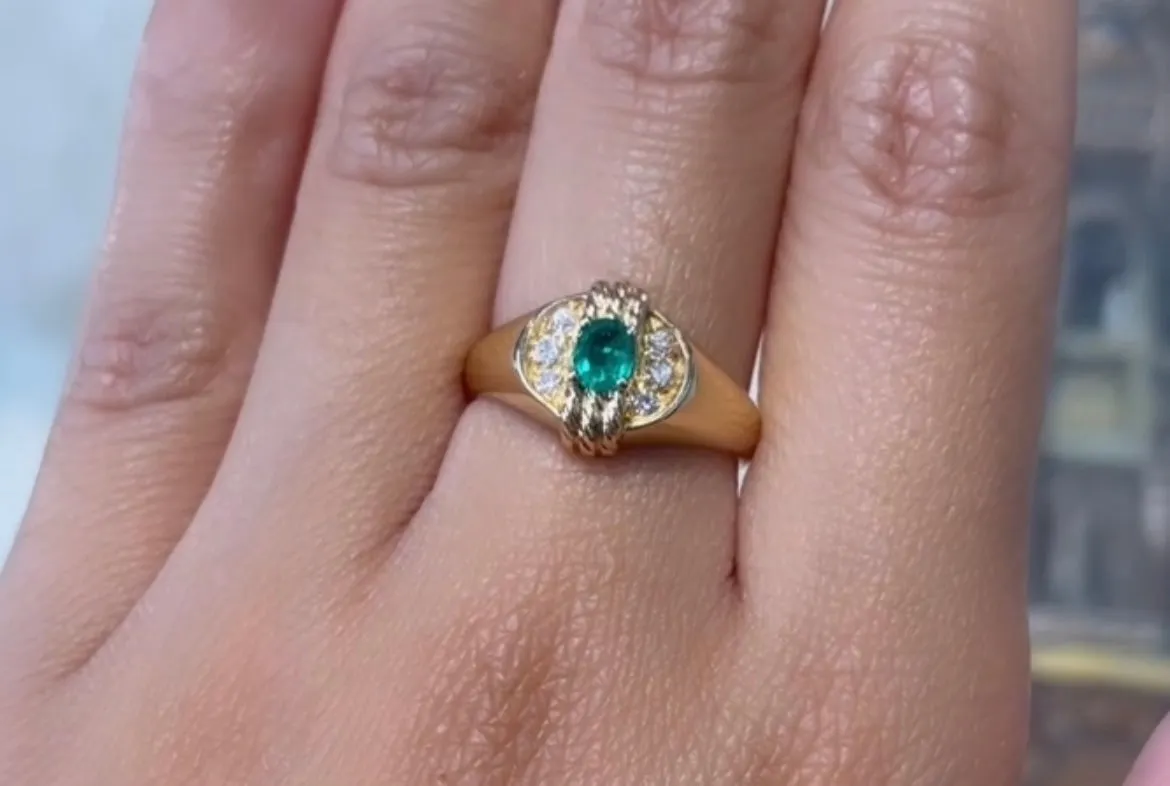 Emerald and diamond ring in 18 carat gold