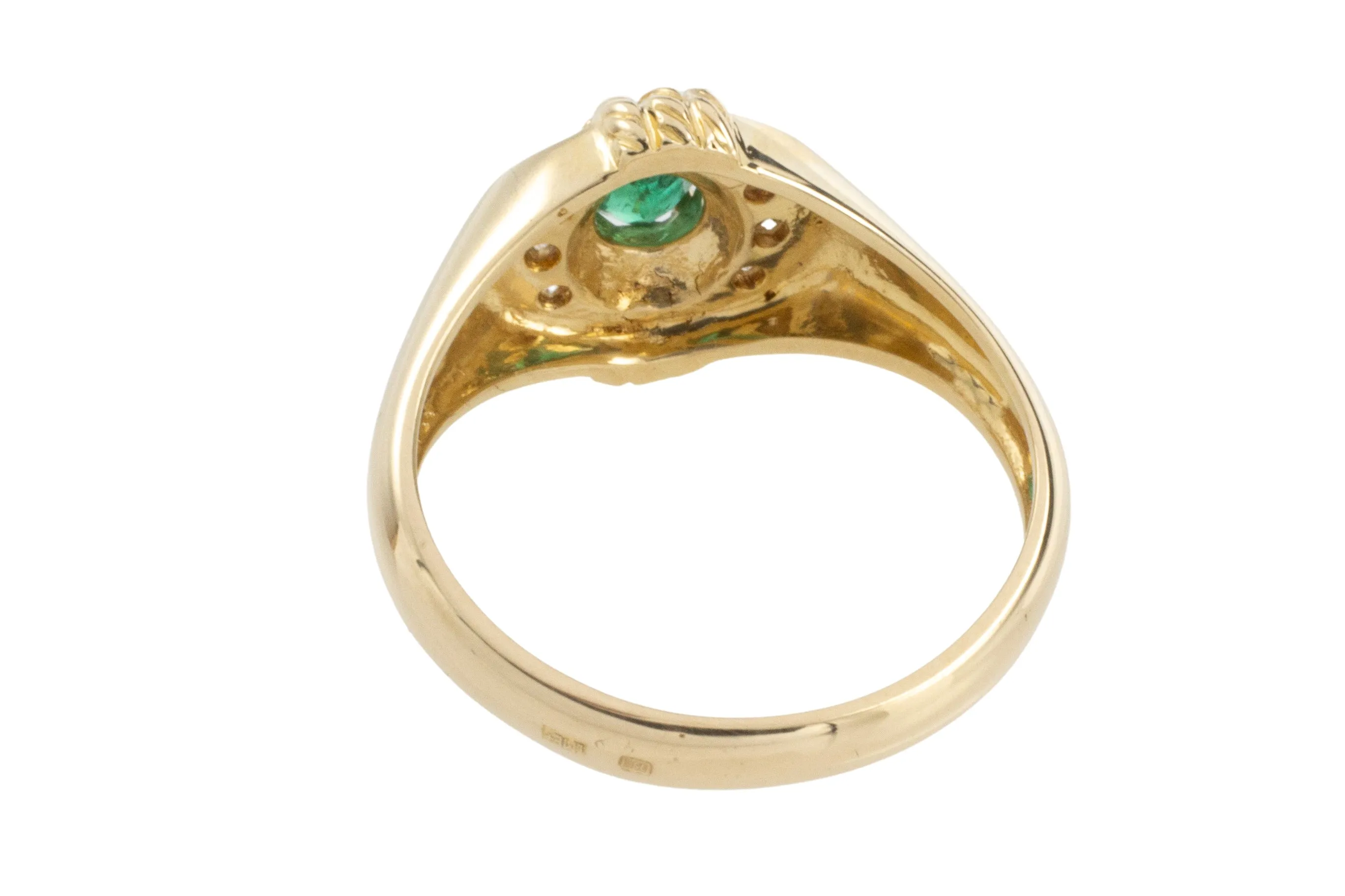 Emerald and diamond ring in 18 carat gold