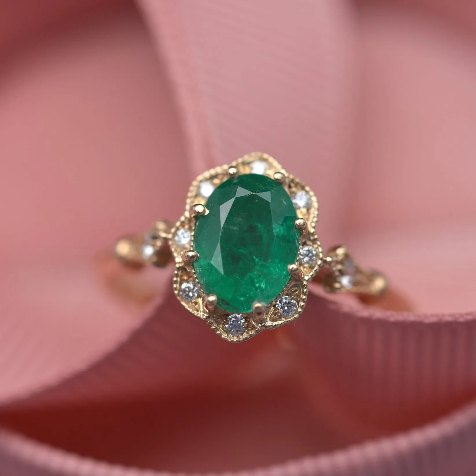 Natural Green Zambian Emerald in a Daisy Oval engagement ring