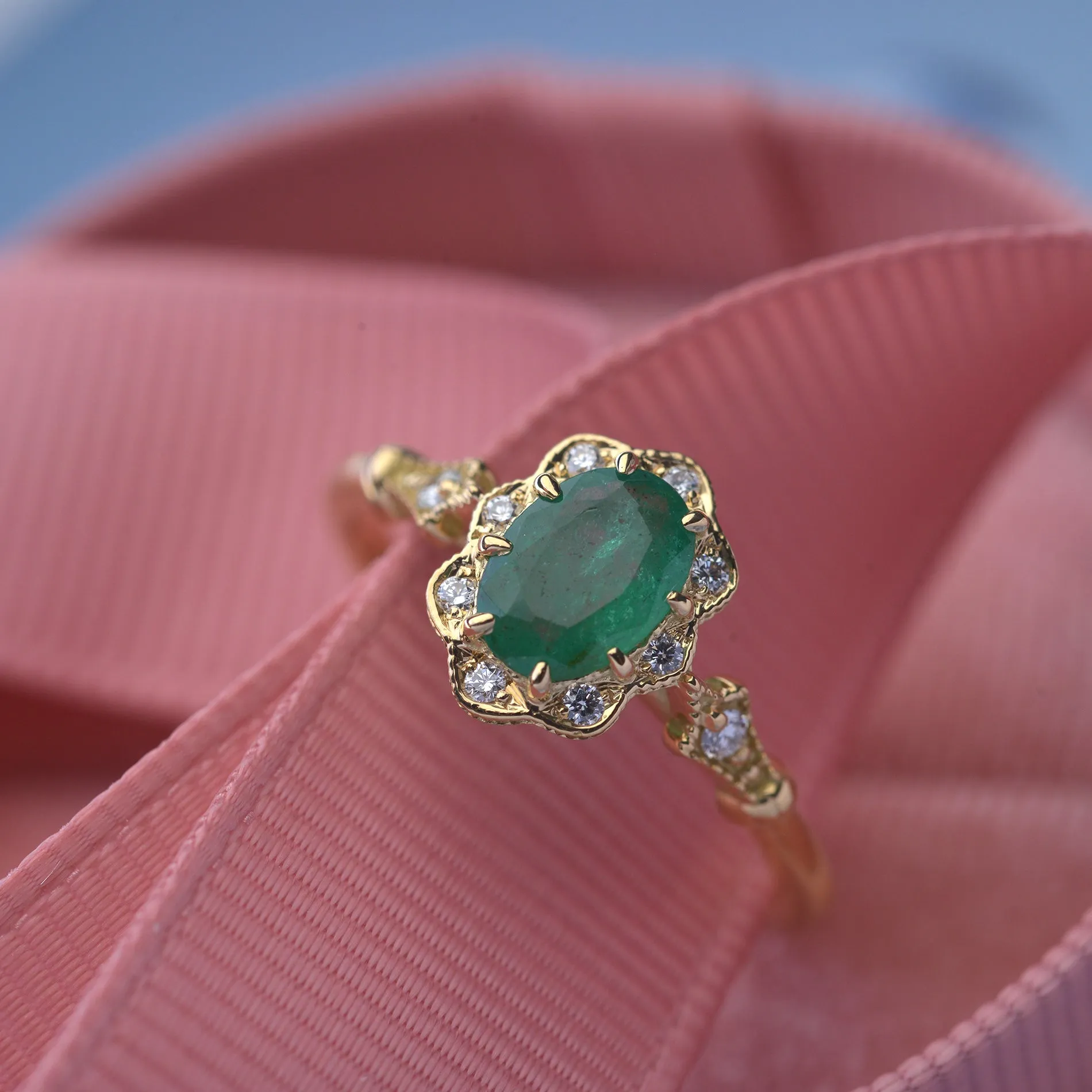 Natural Green Zambian Emerald in a Daisy Oval engagement ring